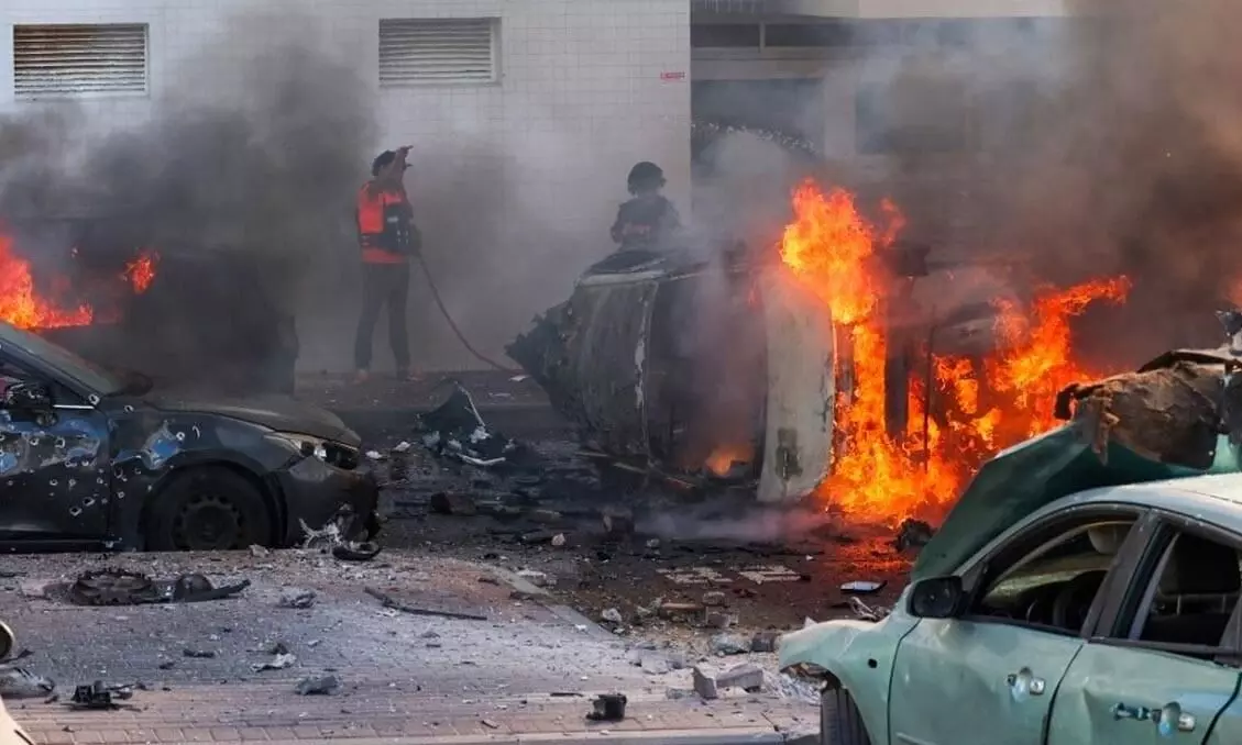 Soldier Fearlessly Risks Life to Rescue Woman From Burning Car, Shields Her from Shrapnel
